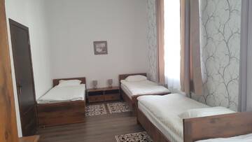 Фото номера Четырехместный номер с душем Отель Hotel Grazhina г. Новогрудок 2